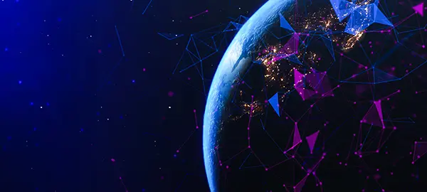 The Earth from space at night rendered as a digital network with blue and purple geometric connections spanning its surface, suggesting global connectivity and data flow for manufacturing operations.